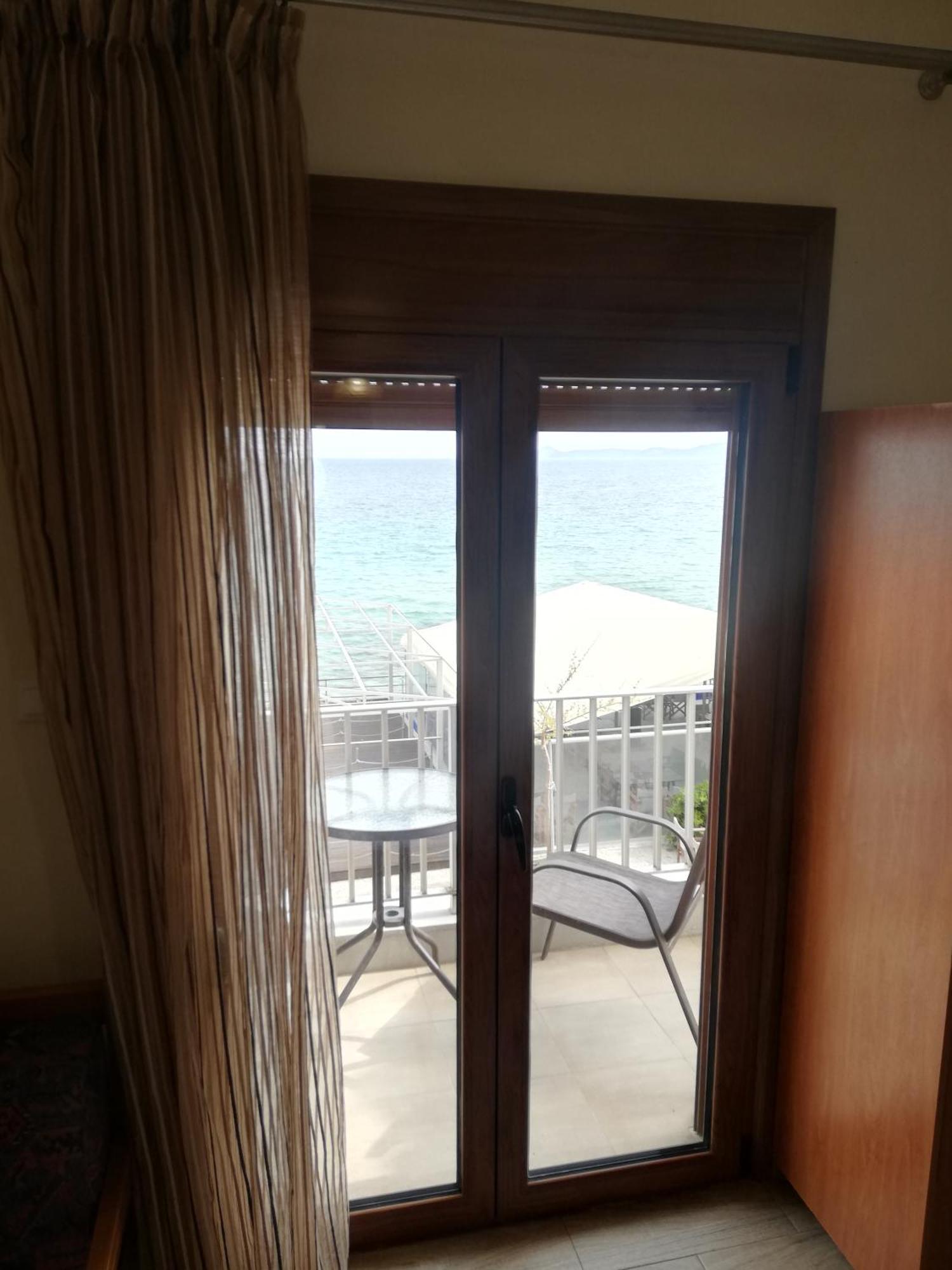 Diolkos Apartement Nea Roda Bilik gambar