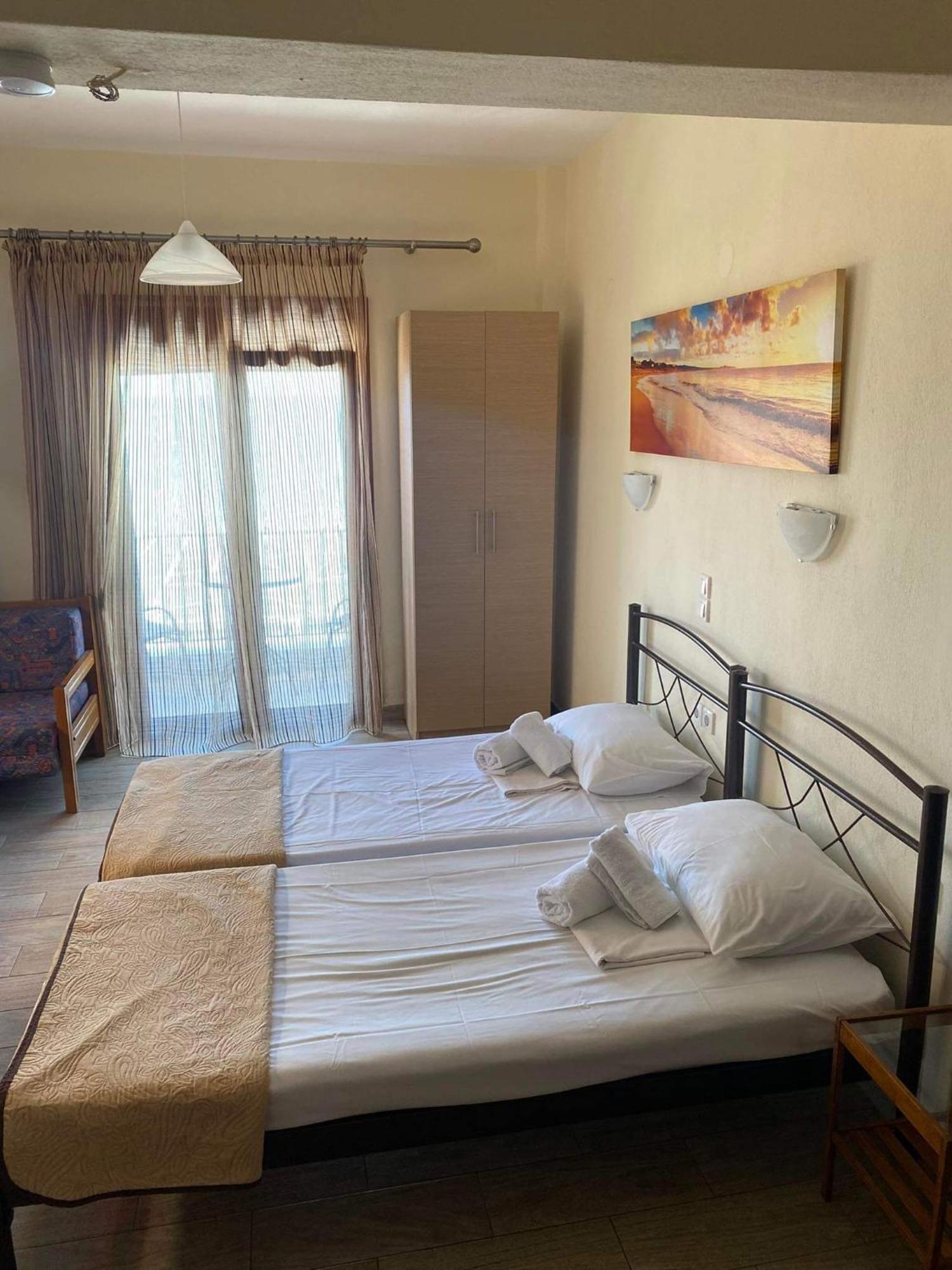 Diolkos Apartement Nea Roda Bilik gambar