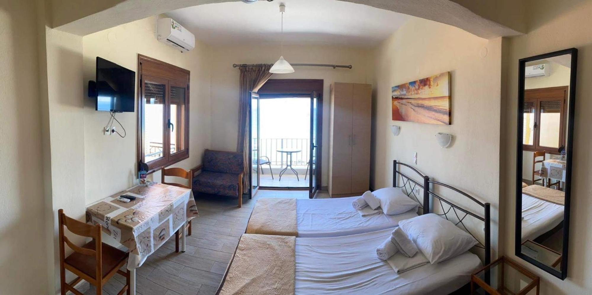Diolkos Apartement Nea Roda Bilik gambar