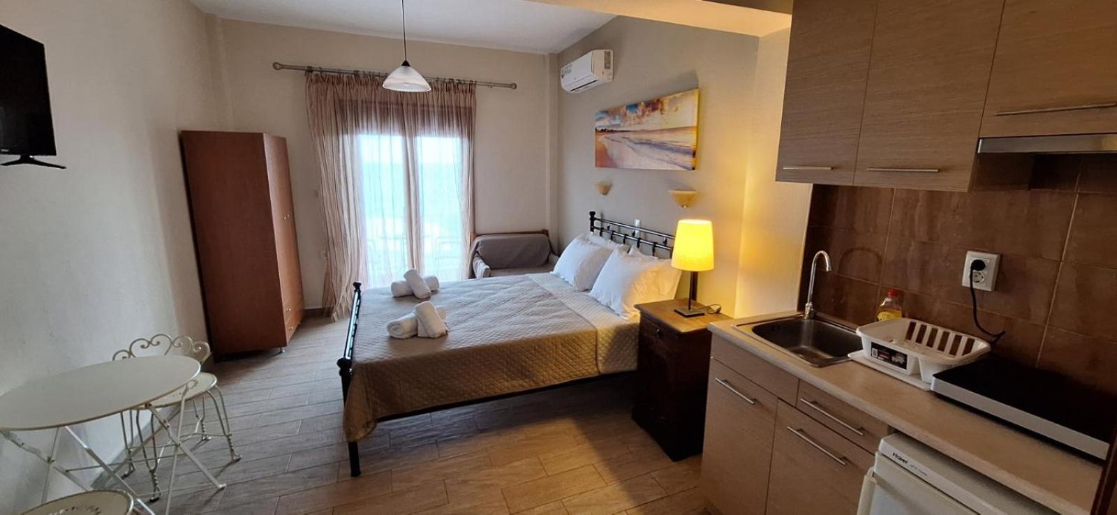 Diolkos Apartement Nea Roda Bilik gambar